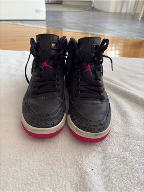 Jordan Black Sneakers with Pink Jumpman Accents